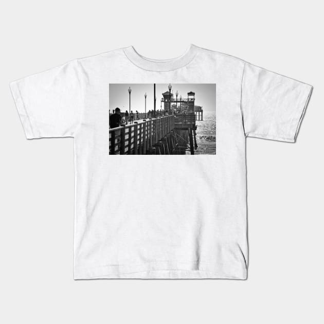 Pedestrian Traffic On The Pier Kids T-Shirt by KirtTisdale